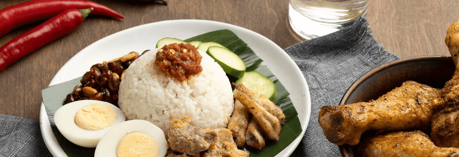 Image of a nasi lemak with chicken on the side